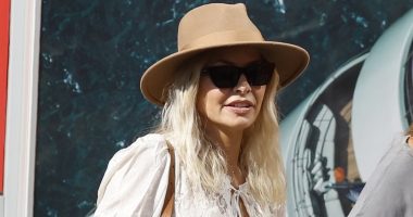 Margot Robbie looks fab in a black mini as she hosts Glasto part