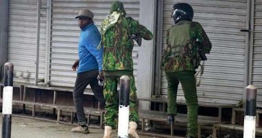 Photos capture the shooting of a civilian by a Kenyan police officer amid protests