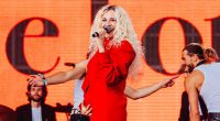 Pixie Lott reveals she is pregnant onstage at Mighty Hoopla