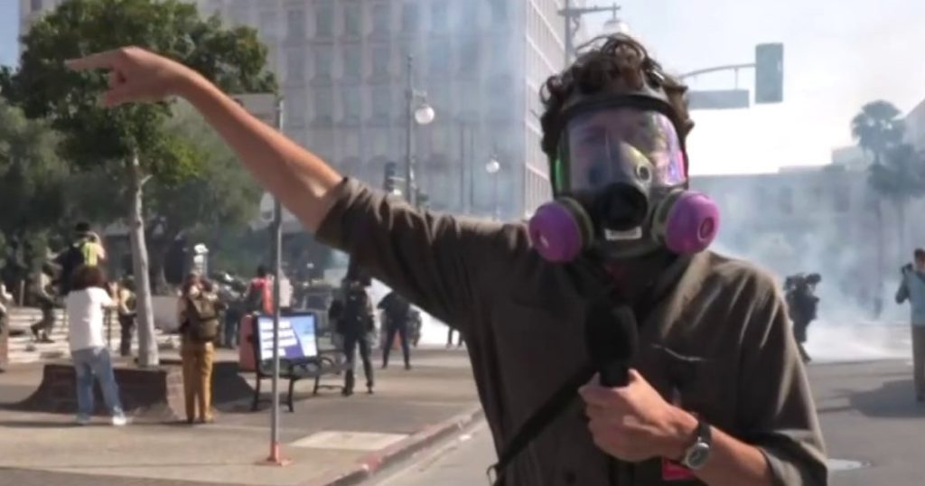 Police deploy tear gas at L.A. protest near federal building