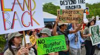 Protesters line highway in Florida Everglades to oppose ‘Alligator Alcatraz’