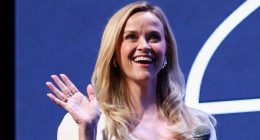 Reese Witherspoon puts on a leggy display in a chic white mini dress