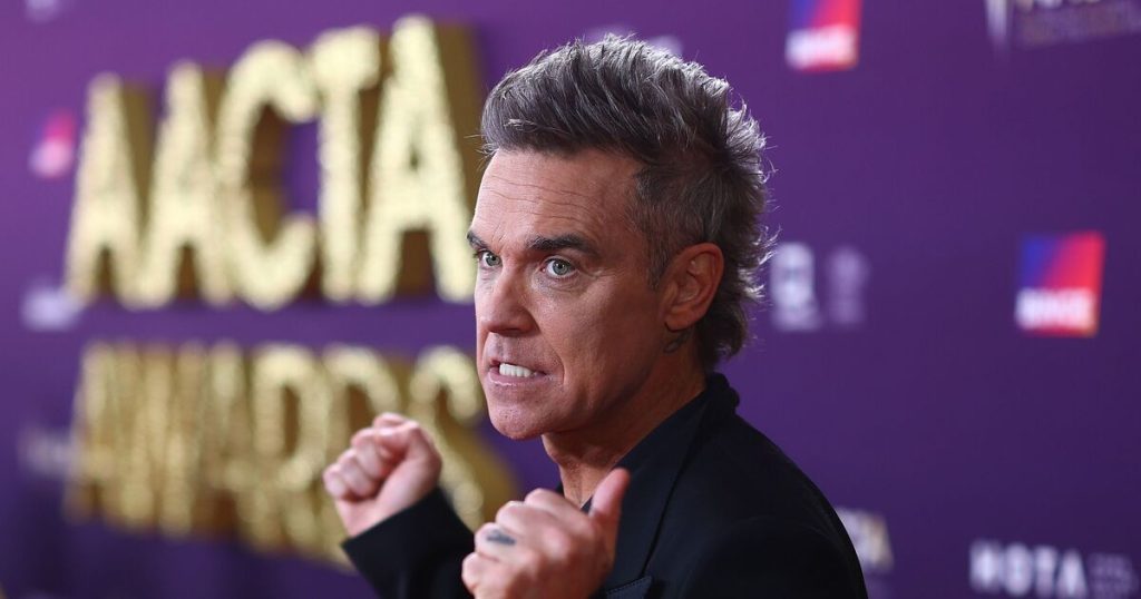 Robbie Williams' four-word text response to Better Man revealed