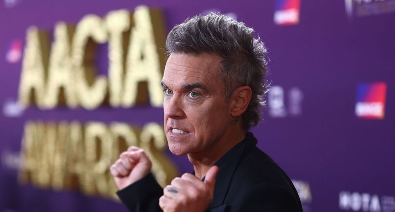 Robbie Williams' four-word text response to Better Man revealed