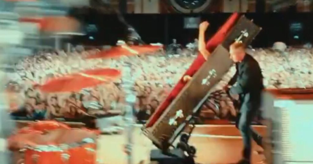 Rock legend's baffling exit as he is wheeled out of London concert in a coffin