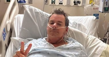 Rock star devastated as he’s diagnosed with ‘very aggressive’ cancer and shares snap from hospital bed