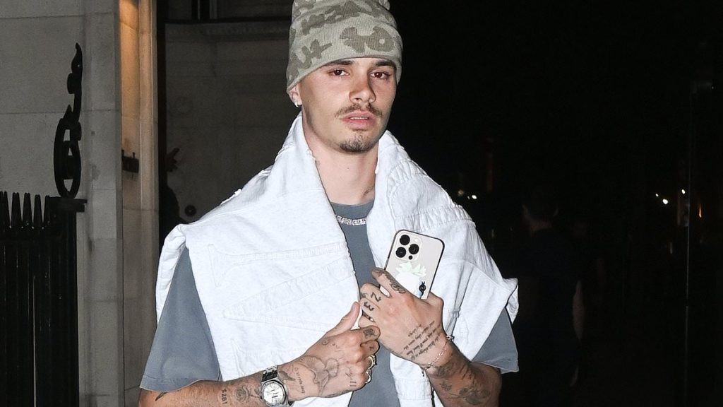 Romeo Beckham debuts new tattoo outside plush Mayfair hotel