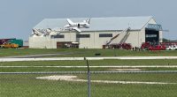 Small plane crashes onto hangar roof at Kansas airport