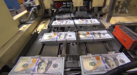 State supreme court puts lawmaker pay raise on hold