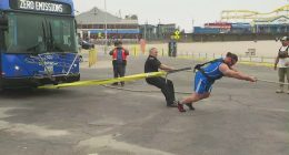Strongman pulls 34,680-pound bus to kick off Santa Monica festival