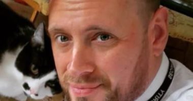 'Superhero' security guard who fought off racist thug who trashed Tesco store was fired and charged with assault after a witness complained