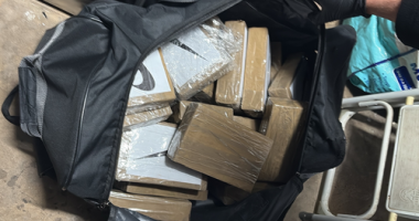 Police have raided a home and a nearby unit in one of Sydney's most exclusive suburbs after a man allegedly attempted to collect 30kg of cocaine from a car park. The 40-year-old allegedly attended a dead drop, a secret location where cash and illicit drugs are left for people to collect, in Alexandria yesterday.
