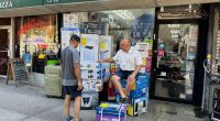 Temperature in New York City reaches 100 degrees as eastern US swelters under extreme heat wave
