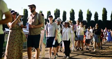 Tennis fans told NOT to travel to Wimbledon with queue 'at capacity' and crowds facing 'several hours to get in' in 34C on hottest opening day ever