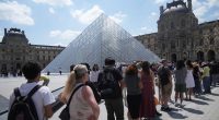 The Louvre, the world's most-visited museum, shuts down with staff sounding the alarm on mass tourism