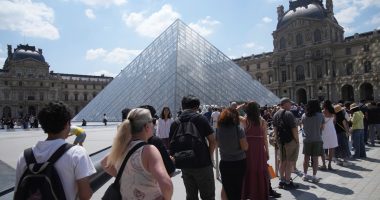 The Louvre, the world's most-visited museum, shuts down with staff sounding the alarm on mass tourism