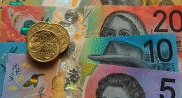 Australian $50, $20, $10 and $5 banknotes and dollar coins.