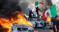 Trump orders the arrest of everyone in face masks and says 'bring in the troops' as LA burns, looting breaks out and violence spirals out of control following migrant crackdown protests