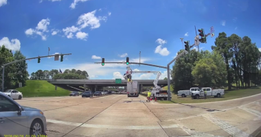 VIDEO: 18-wheeler hits Louisiana state employee working in utility bucket truck