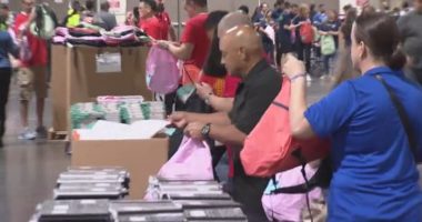 Volunteers fill backpacks for 25K Central Florida students