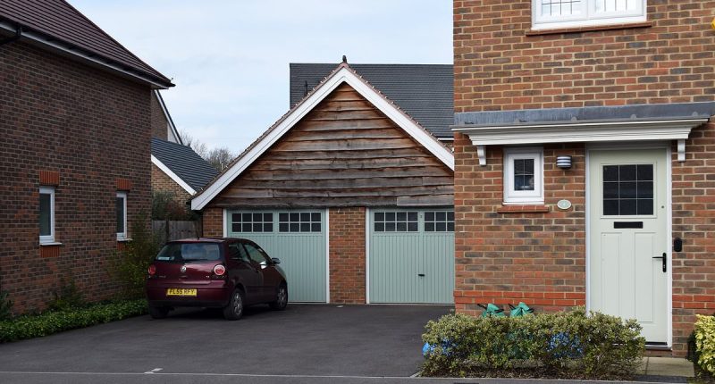 We loathe our neighbours - can we put a fence down the middle of our shared driveway?