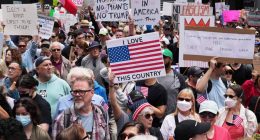 Woman charged in connection to anti-ICE protest where car drove through crowd