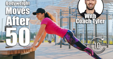 Woman doing incline push-ups on a bench in an outdoor gym, focusing on strength and endurance during her fitness routine in an urban park. 4 Bodyweight Exercises Women Should Do Every Day After 50. Cover