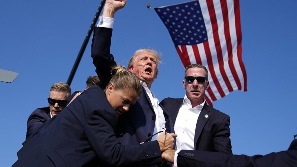 4 tiny details you missed in Trump fist pump post-shooting photo