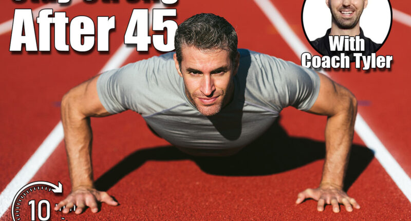 Mature fitness man in gray t-shirt looking and doing push-ups on the red running track. Copy space. Close up. Lifestyle and sports. 5 Classic Exercises Men Should Do Every Day to Stay Young After 45. Cover,