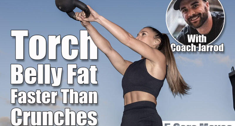 Low angle of determined female athlete in activewear with ponytail lifting heavy kettlebell in outstretched arms during fitness workout on sports ground in evening. 5 Core Moves That Burn Belly Fat Faster Than Crunches. Cover