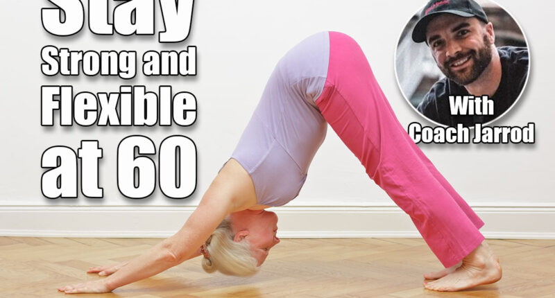 Senior woman with gray hair doing yoga exercise at home in front of a white wall, asana downward dog. 5 Daily Moves That Keep Your Body Strong and Flexible at 60 , cover