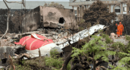 Plane wreckage in a damaged building.