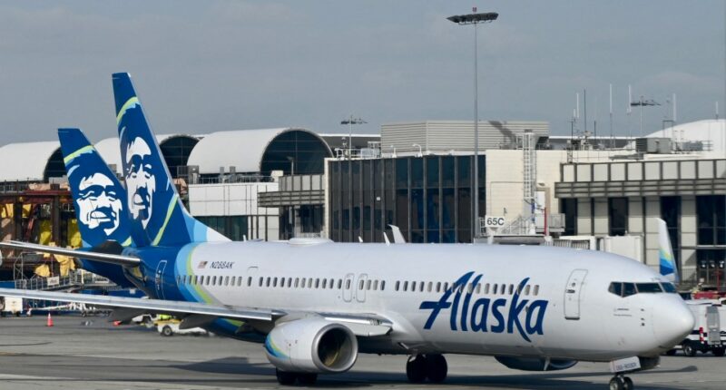 Alaska Airlines plane at an airport.