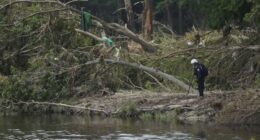 Amid new flood warnings, emergency crews suspend search for flooding victims in Texas