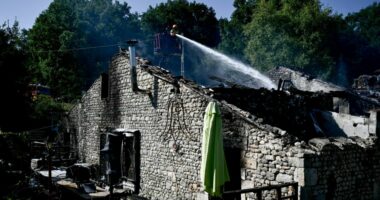 Firefighters work at the site of a French holiday cottage gite for disabled adults where a fire broke out leaving one person dead and four people still missing in Montmoreau, south-western France, on July 28, 2025. According to a gendarmerie source, 12 disabled people were inside, in addition to the couple who run the gite. The fire is thought to have been caused by a fault in the electrical installation, according to the same source. (Photo by Philippe LOPEZ / AFP) (Photo by PHILIPPE LOPEZ/AFP via Getty Images)