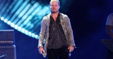Brian Littrell of the Backstreet Boys performing onstage.