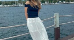 Eliotte Heinz, a missing graduate student, on a pier by the water.