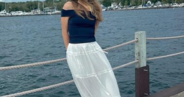 Eliotte Heinz, a missing graduate student, on a pier by the water.
