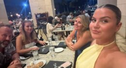 Family at an outdoor restaurant.