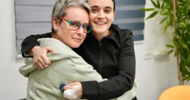 A released Israeli hostage embraces her mother.