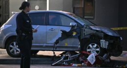 California man accused of ramming car into LA crowd is convicted felon out on parole, police say