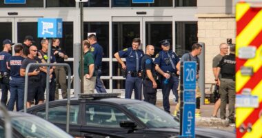 Law enforcement officers at a crime scene.