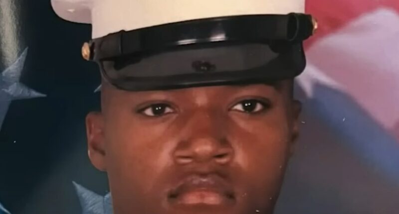 Portrait of a young Marine in uniform.