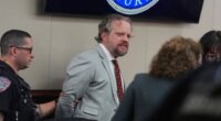 Dentist James Craig being led away in handcuffs after his murder trial verdict.