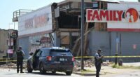 Partial collapse of a Family Dollar store with police and fire department personnel at the scene.
