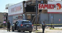 Partial collapse of a Family Dollar store with police and fire department personnel at the scene.
