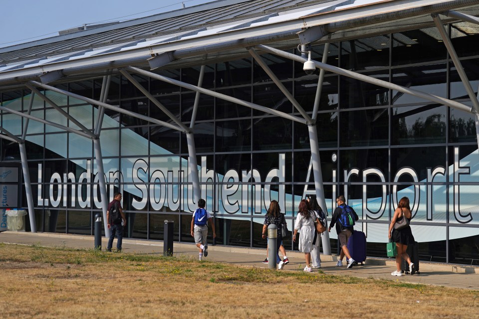 Passengers walking outside London Southend Airport.