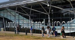 Passengers walking outside London Southend Airport.