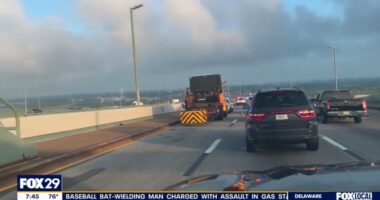 Traffic jam on a bridge due to a tractor-trailer accident.