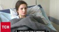 Injured woman in hospital bed.